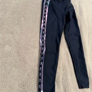 SoulCycle Navy Leggings with Iridescent Skull Side Stripes